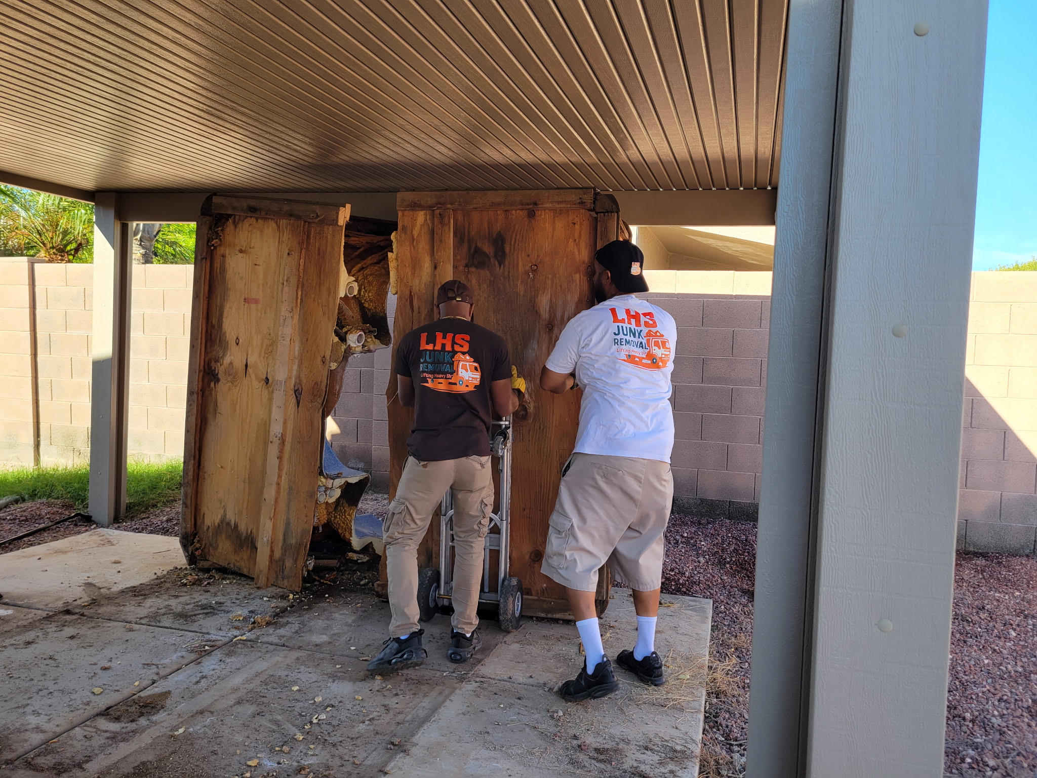 Men disassembling things