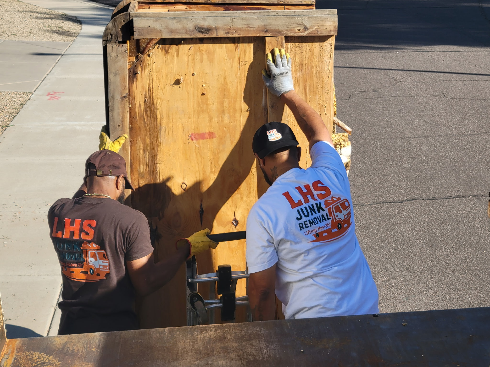Men helping carrying things