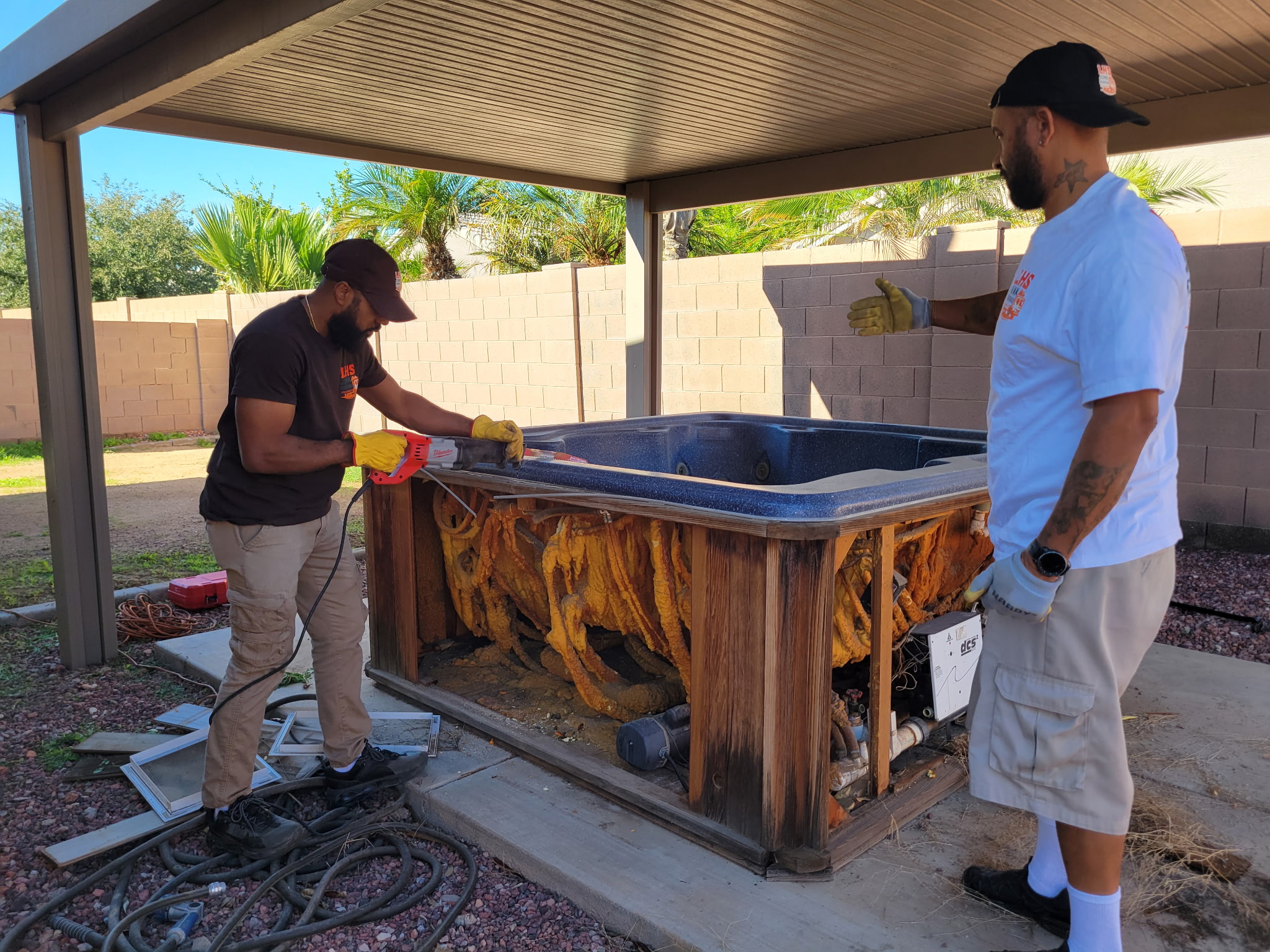 Men disassembling things
