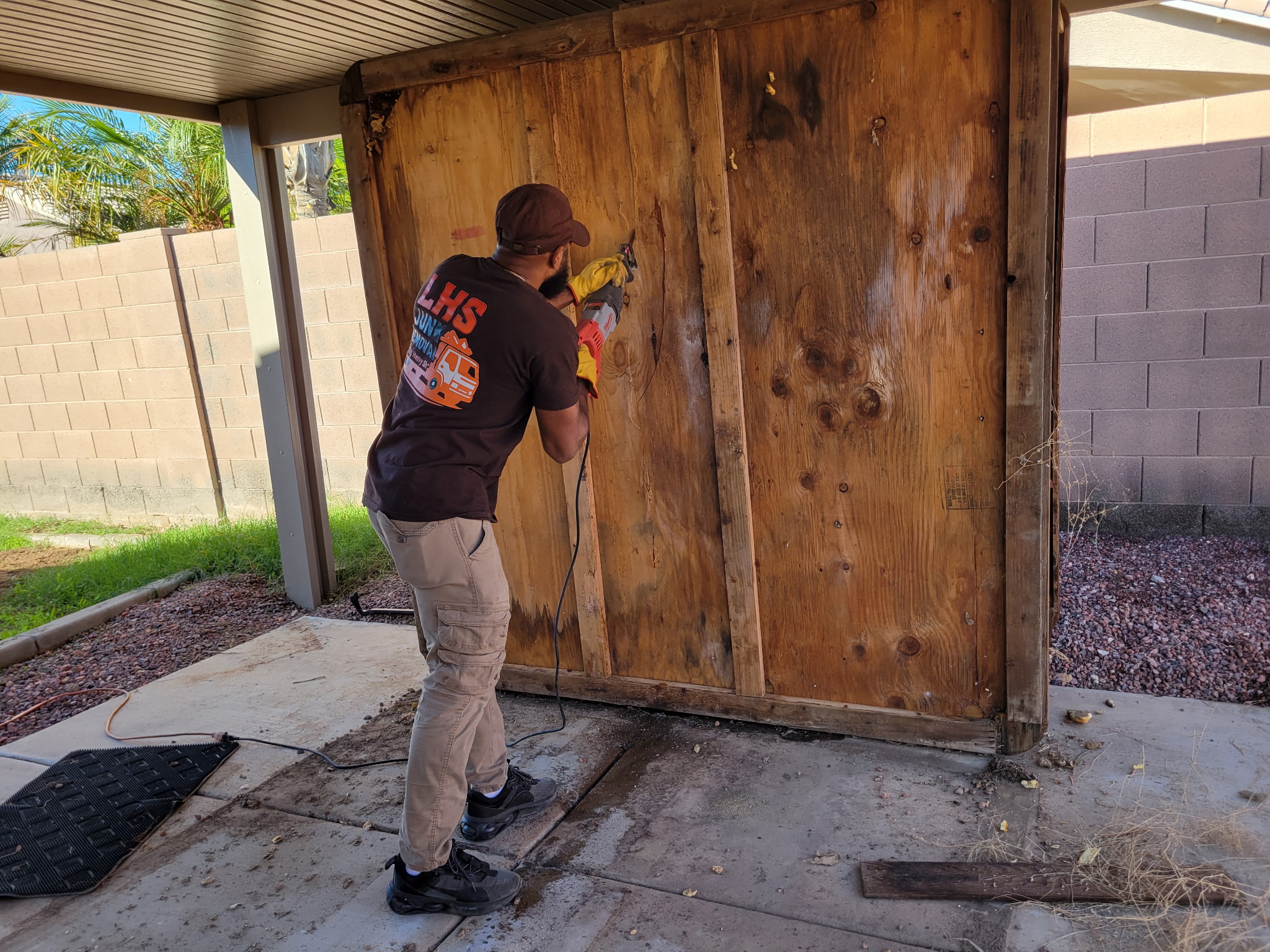 Men disassembling things