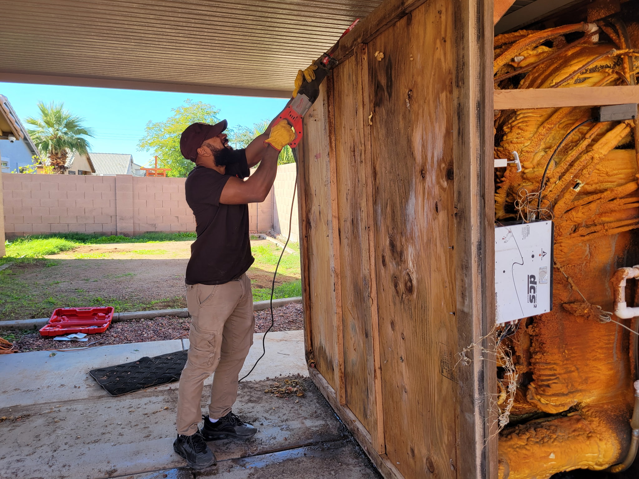 Men disassembling things