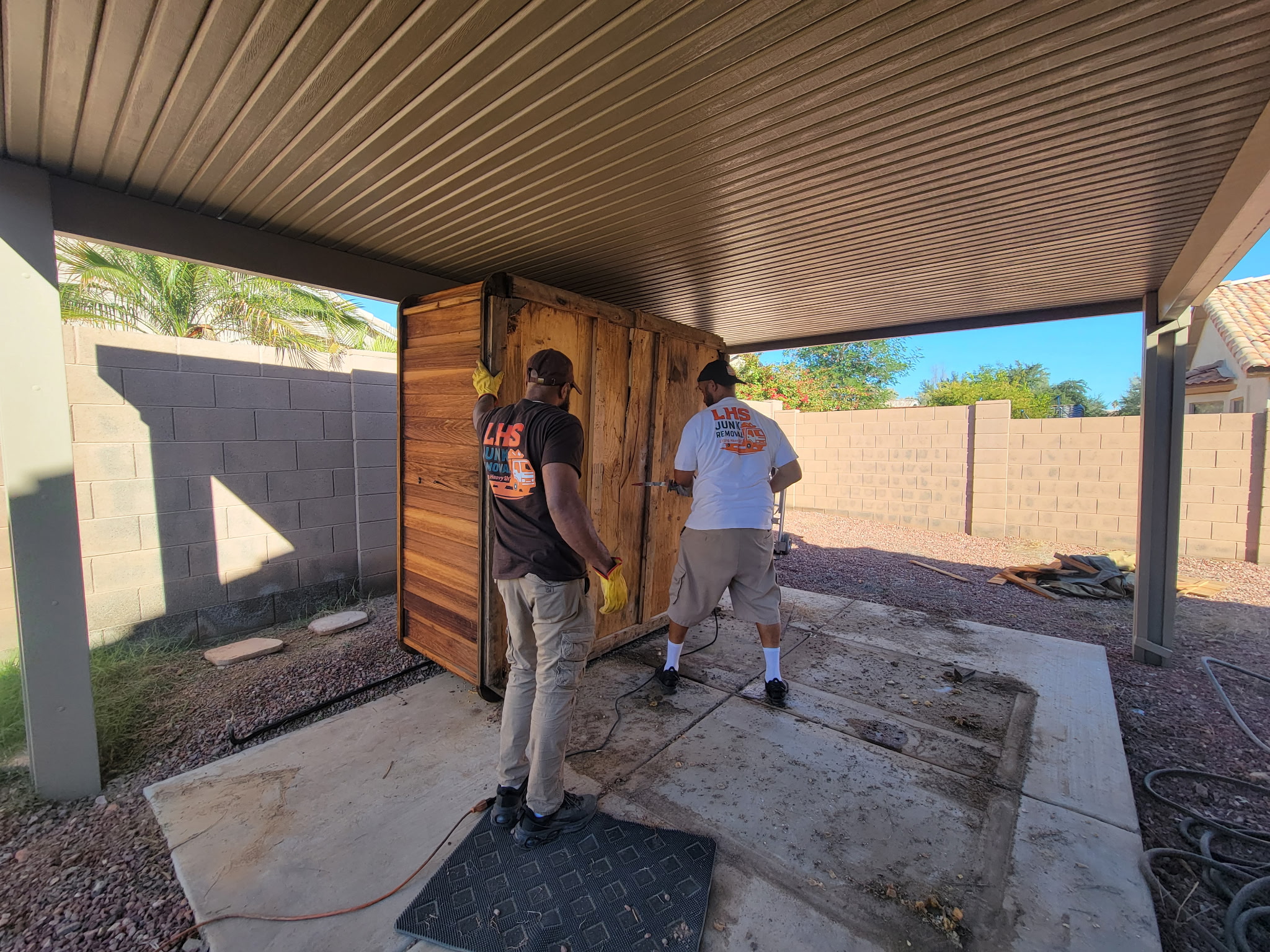 Men disassembling things